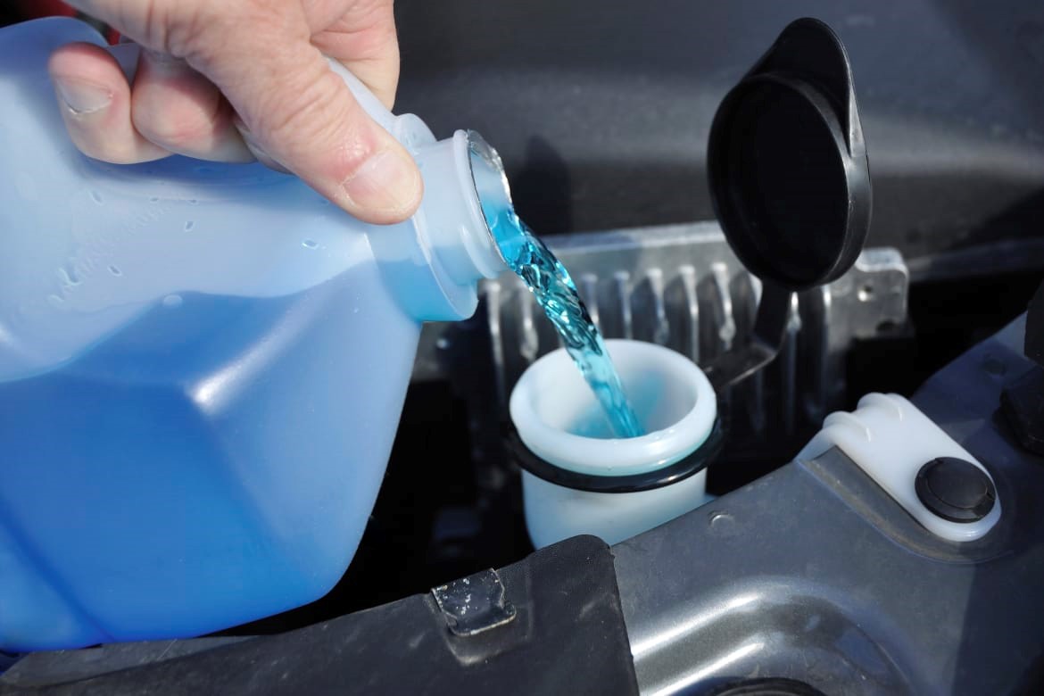 adding windshield wiper fluid